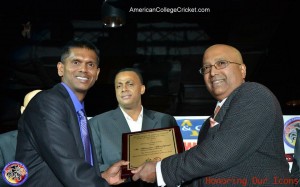 Shiv Chanderpaul being inducted into the American College Cricket Hall of Fame, by Lloyd Jodah. Fast bowling great Courtney Walsh is center.