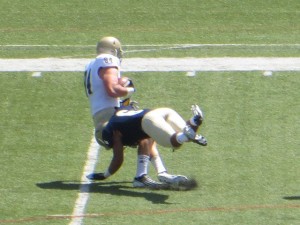 UC Davis' tight end Cameron Sentance catching a pass (& a rush !). Cameron is a cricket player too, but does not get to play these days. Photo by David Sentance