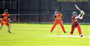 Ibrahim coverdriving, playing for Harvard in 2013 at the Philadelphia Cricket Club